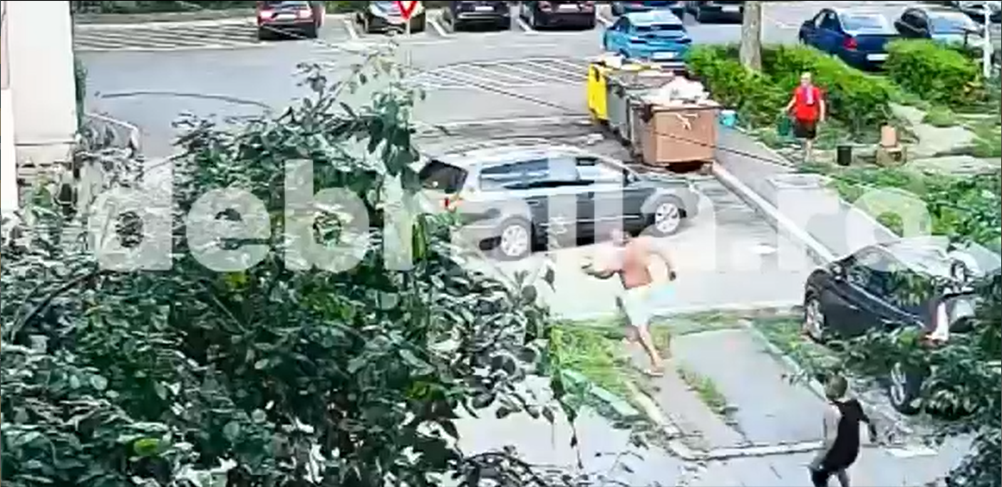 VIDEO: Tineri urmăriţi cu cuţitele pe o stradă din Brăila. Agresorii le-au distrus şi maşinile parcate